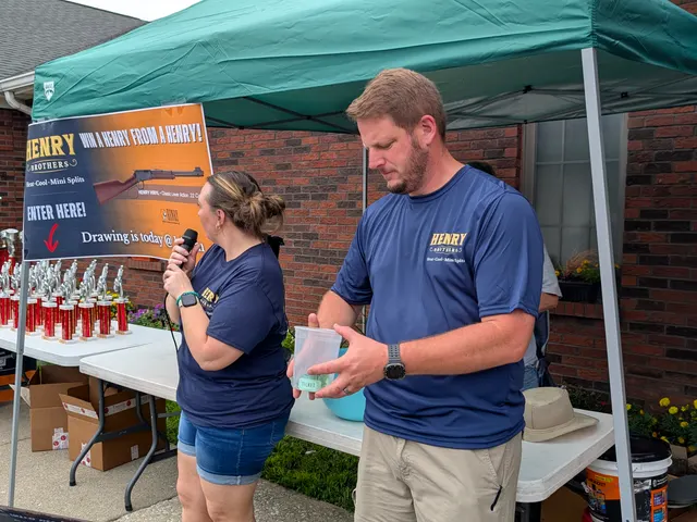Henry Brothers mini-split team running raffle drawing at Jeffersonville Indiana community event