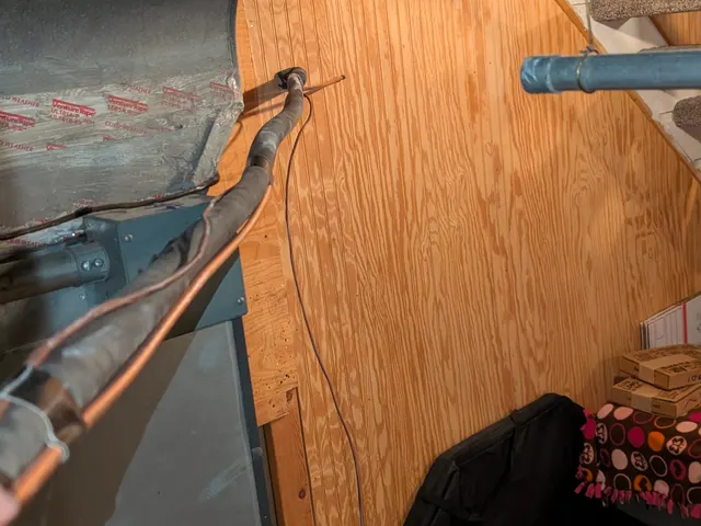 Refrigerant line set routed through the attic ceiling space during an HVAC installation