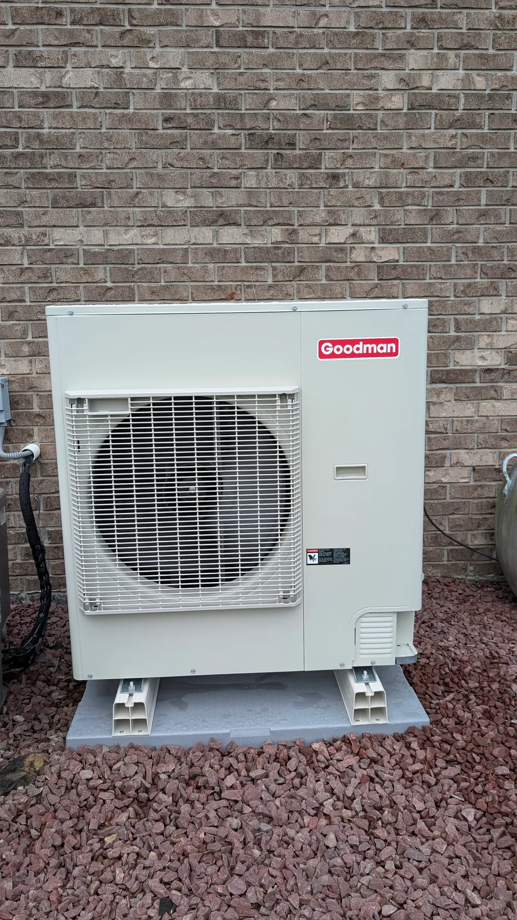 New Goodman mini-split outdoor condenser unit installed on pad Clark County Indiana after installation