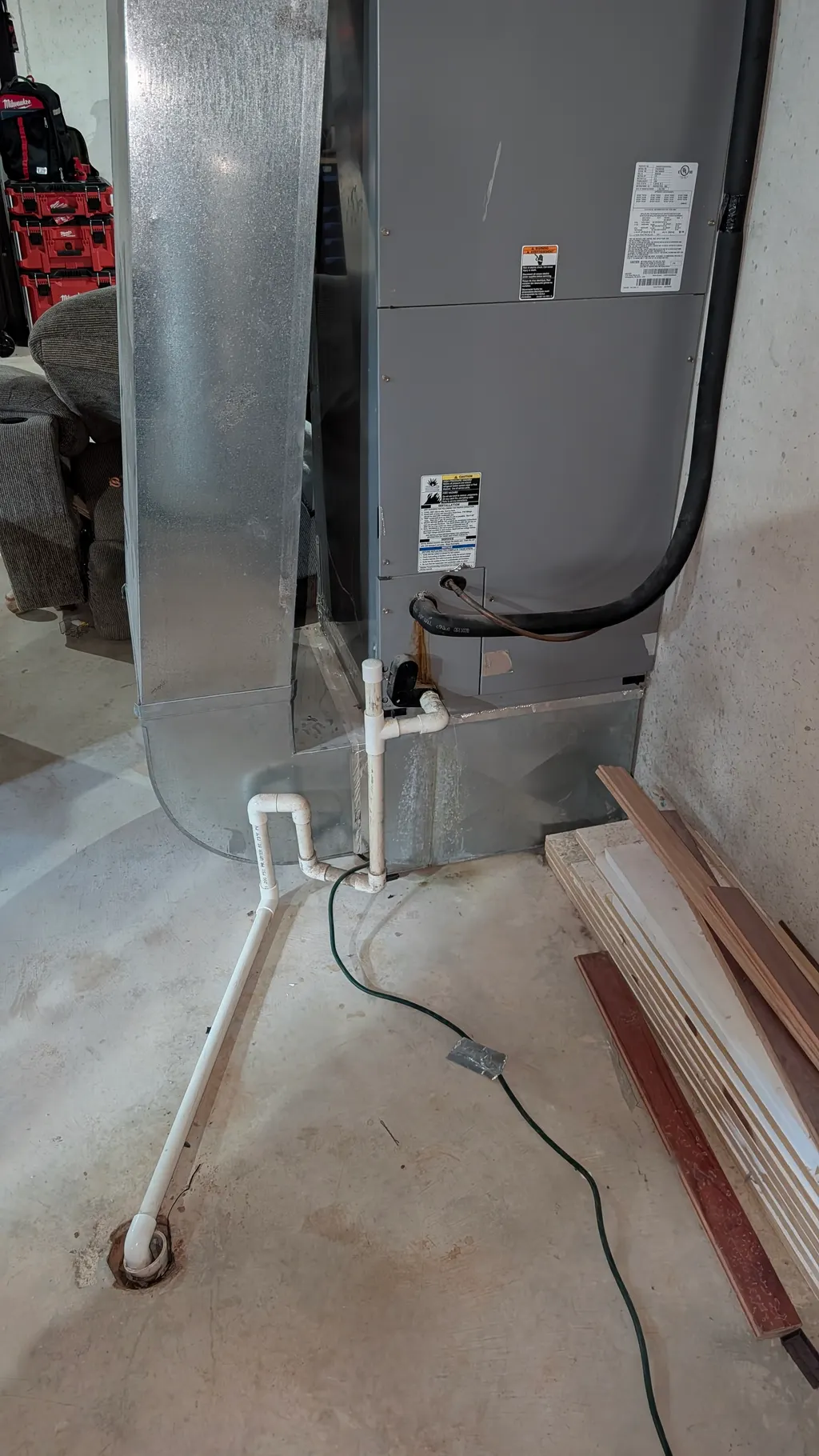 Bryant air handler and condensate drain in the basement before second-opinion inspection, Memphis Indiana