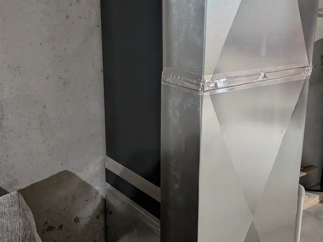Custom sheet metal supply plenum and trunk ductwork fabricated in a Memphis, Indiana basement mini split install