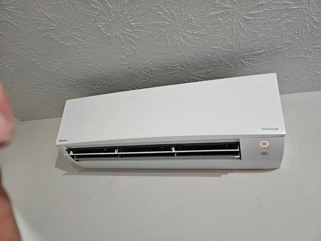 Daikin Inverter mini-split indoor wall unit installed in room with textured ceiling southern Indiana