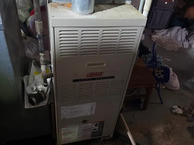 Older Lennox Elite Series gas furnace assessed during an HVAC second opinion in southern Indiana