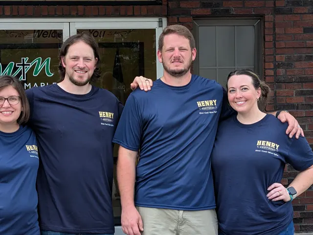 Henry Brothers mini-split HVAC team of four in branded shirts Jeffersonville Indiana